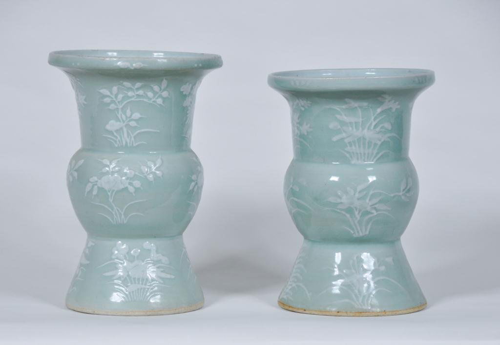 Two Similar Celedon Vases: Two Asian vases decorated in white fern and floral design Condition: good Size: 13"good13"