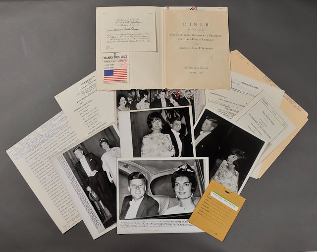 1961-May-June, J.F.K.: (1) Pamphlet on the "Berlin Crisis," a Dave Powers report on trip to Vienna and Paris, press release, (5) photographs of J.F.K. traveling with Jackie, 8" x 10", taken by the Associated Press. An (11) 