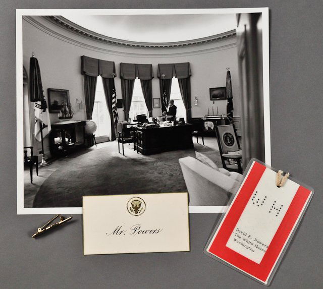 1961-Dave Powers Oval Office Materials: (1) Photograph of Dave Powers in the Oval Office, 8" x 10", taken by Cecil Stoughton. Together with a laminated David F. Powers White House Pass, card with Presidential Seal and a PT 109 "Kennedy" pin