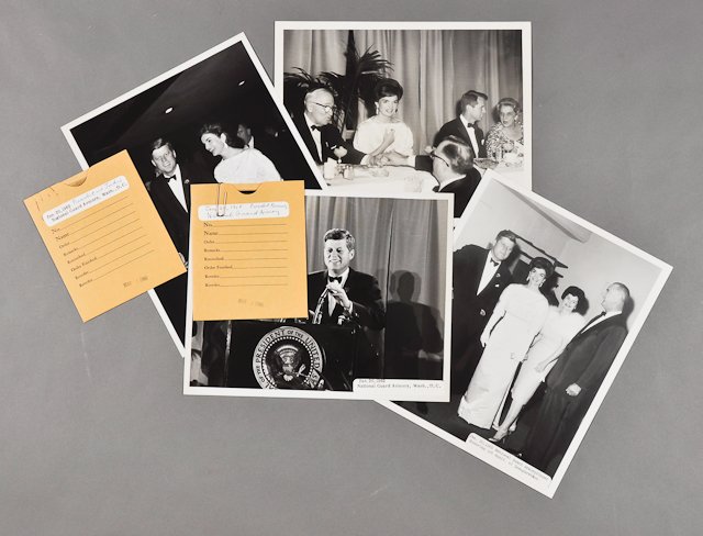 1962-Jan 20, J.F.K., with Harry S. Truman: (2) Photographs of dinner at National Guard Armory with the Kennedys and the Johnsons and Harry Truman with Jackie and Bobbie on Jan. 20, 8" x 10", taken by Abbie Rowe. Pressure sensitive adhesive low