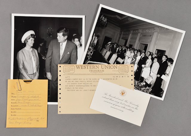 1962-June 21, J.F.K., Powers Anniversary: (1) Telegram from the Kennedys congratulating Dave and Jo Powers on their 10th wedding anniversary. Toning. (1) Formal congratulations on card stock bearing the Presidential Great Seal, 3 1/2" x 6". T