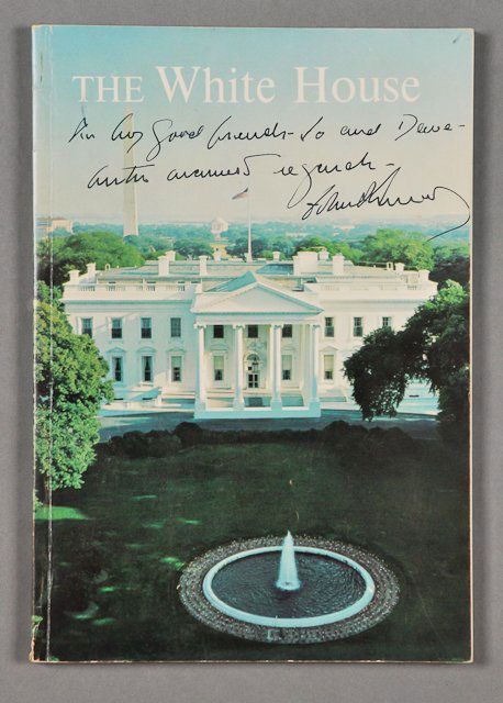 1962-J.F.K., Signed Book: (1) Paperback copy of "The White House," signed on cover "To my good friends- Jo and Dave-With warmest regards- John F. Kennedy". Condition: Toning, minor soiling Notes: Extremely rare copy annotated