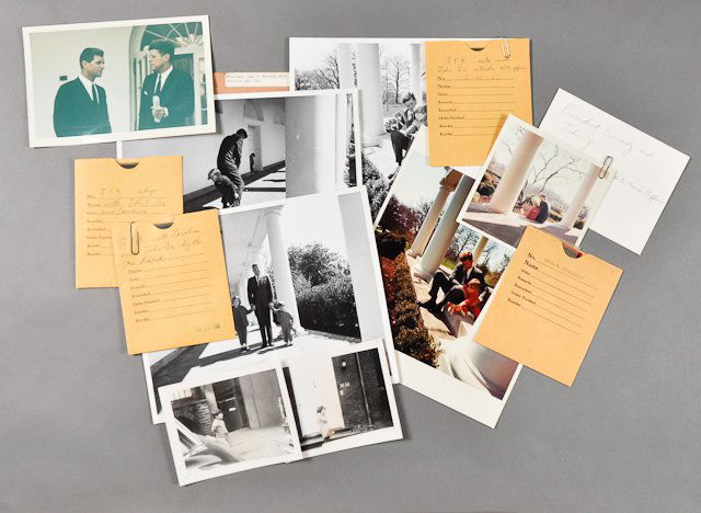 1963-Mar, J.F.K., Kennedy Family Photos: (1) Color photograph, later reprint, of J.F.K. and John, Jr. on the White House Steps. 5" x 5". Taken by Cecil Stoughton. (2) Snapshots of Caroline and John, Jr. on city sidewalks. 4" x 5" each. Tack