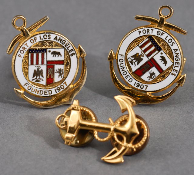 1963- J.F.K., Gifts to Dave Powers: (1) Pair of gold-toned enameled cuff links with the seal for the Port of Los Angeles and (1) Gold-toned lapel pin in the form of a Naval Anchor. Both were personal gifts from J.F.K. to Dave Powers Con