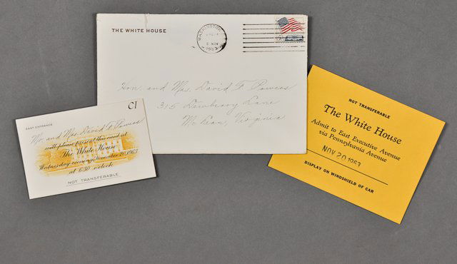 1963-Nov 20, White House Access: (1) East entrance to the White House pass for Mr. and Mrs. David Powers. (1) East Entrance Parking Pass. (1) White House Envelope. (1) Color photographs of the Judicial Reception including J.F.K. and