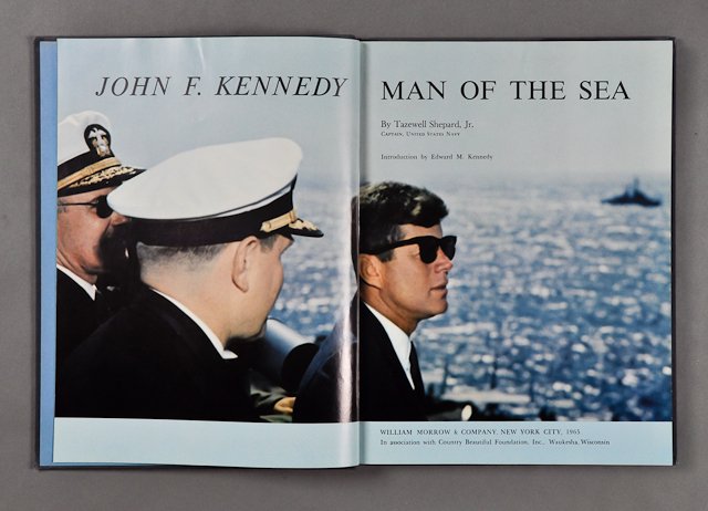 1965-J.F.K., Biography: (1) "John F. Kennedy Man of the Sea" by Tazewell Taylor Shepard, Jr. Hardcover. 162 pp. 12" x 9". Condition: Light abrasions to cover, toning, paperclip impressions, mildew, several bent page corners