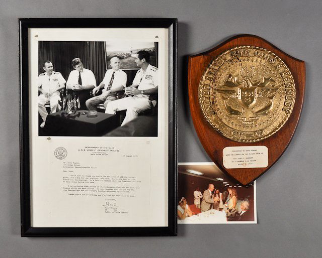 1970-Aug, Dave Powers on board the USS J.F.K.: (1) Photograph of Dave Powers during a television show filmed aboard the USS J.F.K. 8" x 10" and framed with letter from the Public Affairs Officers 17" x 12" overall. (1) Color photograph of Dave Pow