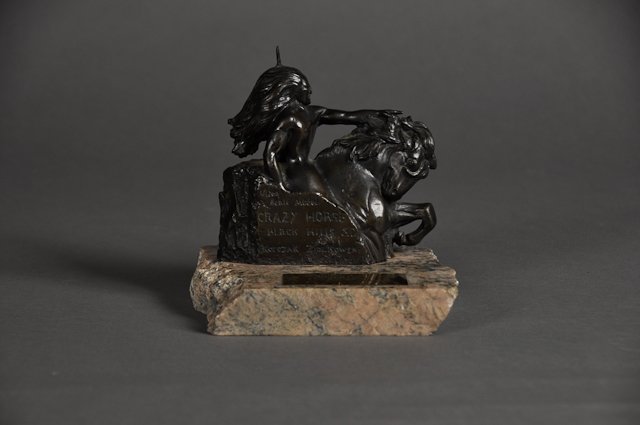 1986-May, Scale Model of Crazy Horse: (1) 1/1200 Scale model of the Crazy Horse Memorial presented to Dave Powers with appreciation from Mrs. Korczak Ziolkowski, wife of the artist. 5" not including granite base. Condition: Good Notes: J.