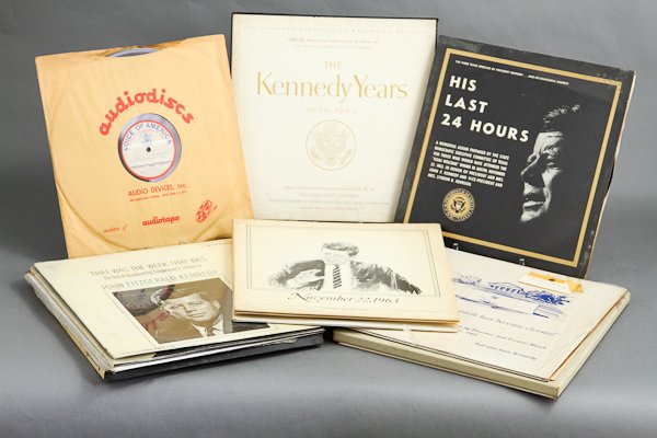 J.F.K. / Political Recordings: (14) LP records including (1) Voice of America "J.F.K. a Personal Memory" 33 1/3 microgroove. (1) "The Kennedy Years" (1) "Ted and Joan Kennedy" Condition: Scratches, wear, abrasions to covers