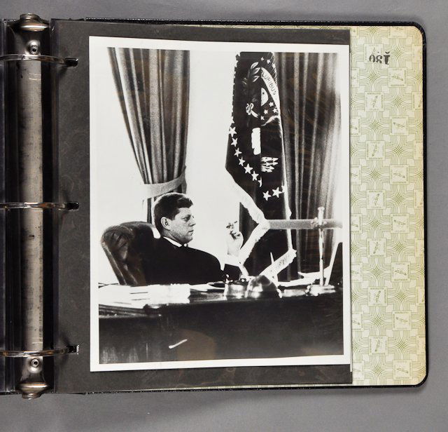 President J.F.K. in the White House Photos: (1) (3) Ring bound photo album assembled by Dave Powers containing (29) photographs including those taken by Jacques Lowe, Fred Star, Cecil Stoughton (Color) 5" x 7" and Robert Knudsen (Color). Many a