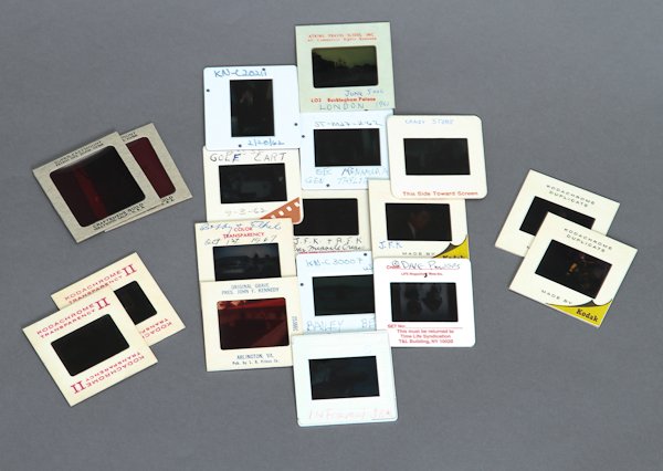 J.F.K., Interesting Slide Lot: (18) Color slides of mostly J.F.K. with family, friends and government officials. Including Cuban Missile Crisis, parade, candy store, Bobby and Ethel, golf cart, etc. Condition: Good