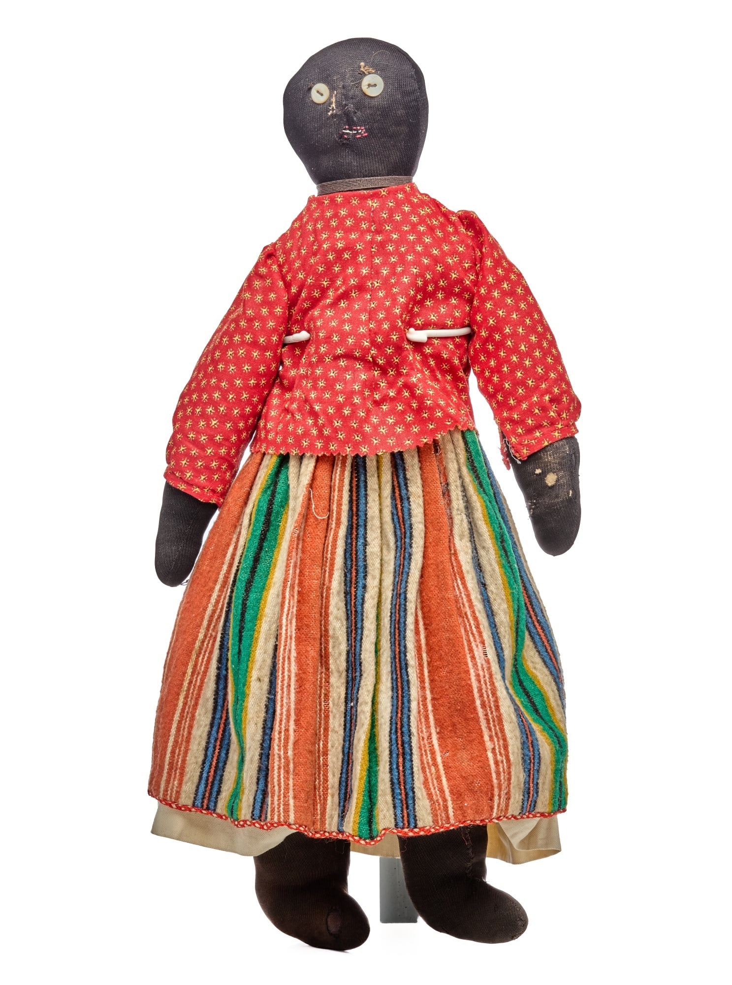 19 IN STOCKINETTE BLACK DOLL BIG ROUND FACE: This big round face stockinette doll has simple but appealing face. She had button eyes, see how her right eye is a little crooked. That is a telltale feature that her button eyes were sewn on before 