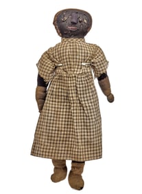 18 IN BLACK DOLL MAYBE AN ENCOUNTER WITH A DOG?
