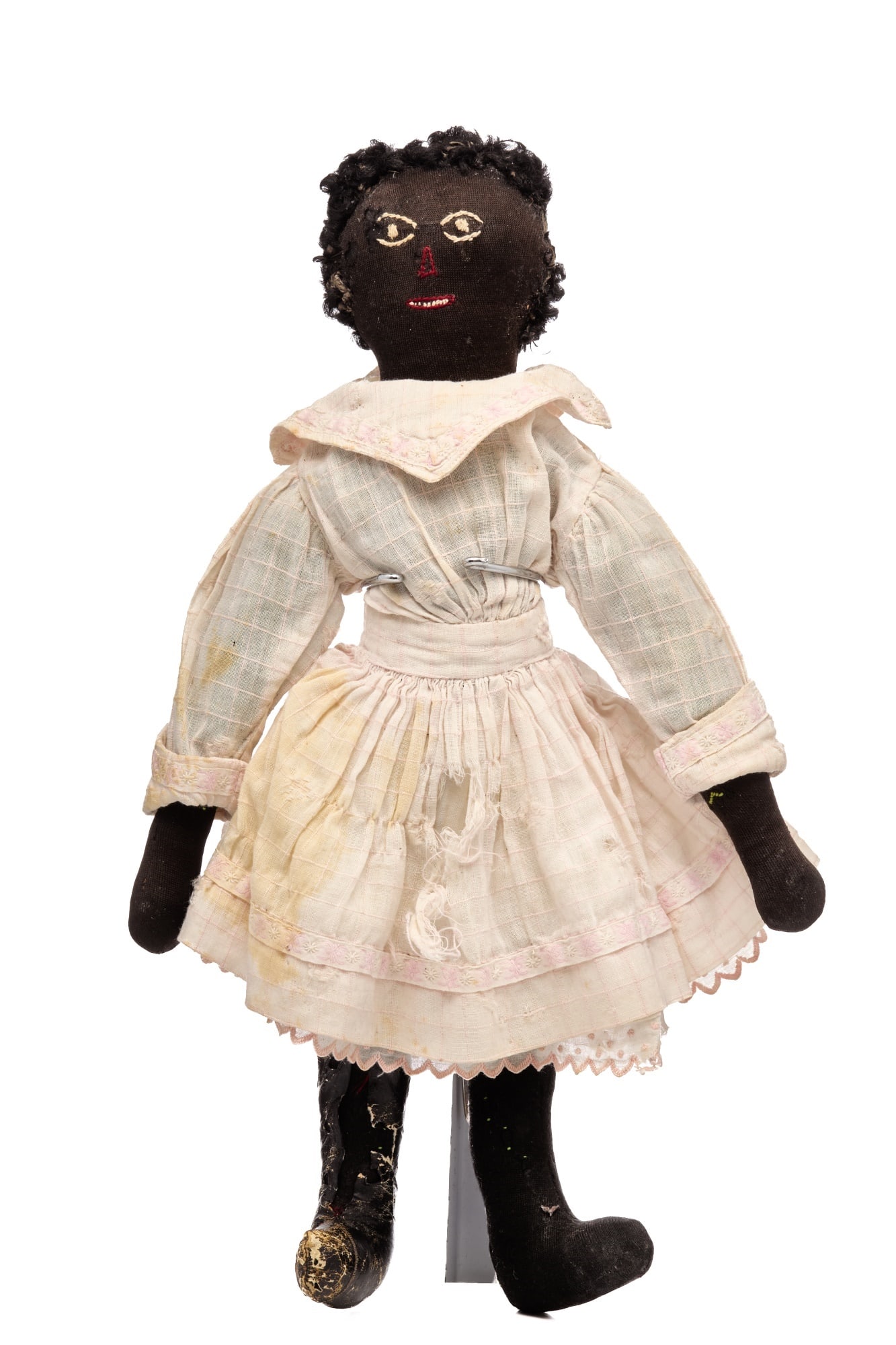 15 IN PETITE BLACK STOCKINETTE DOLL: She is 15” tall but gives the feeling she is smaller because she is delicate in proportion to her height. She has white embroidered eyes, her nose and mouth are sewn with red floss and she has l