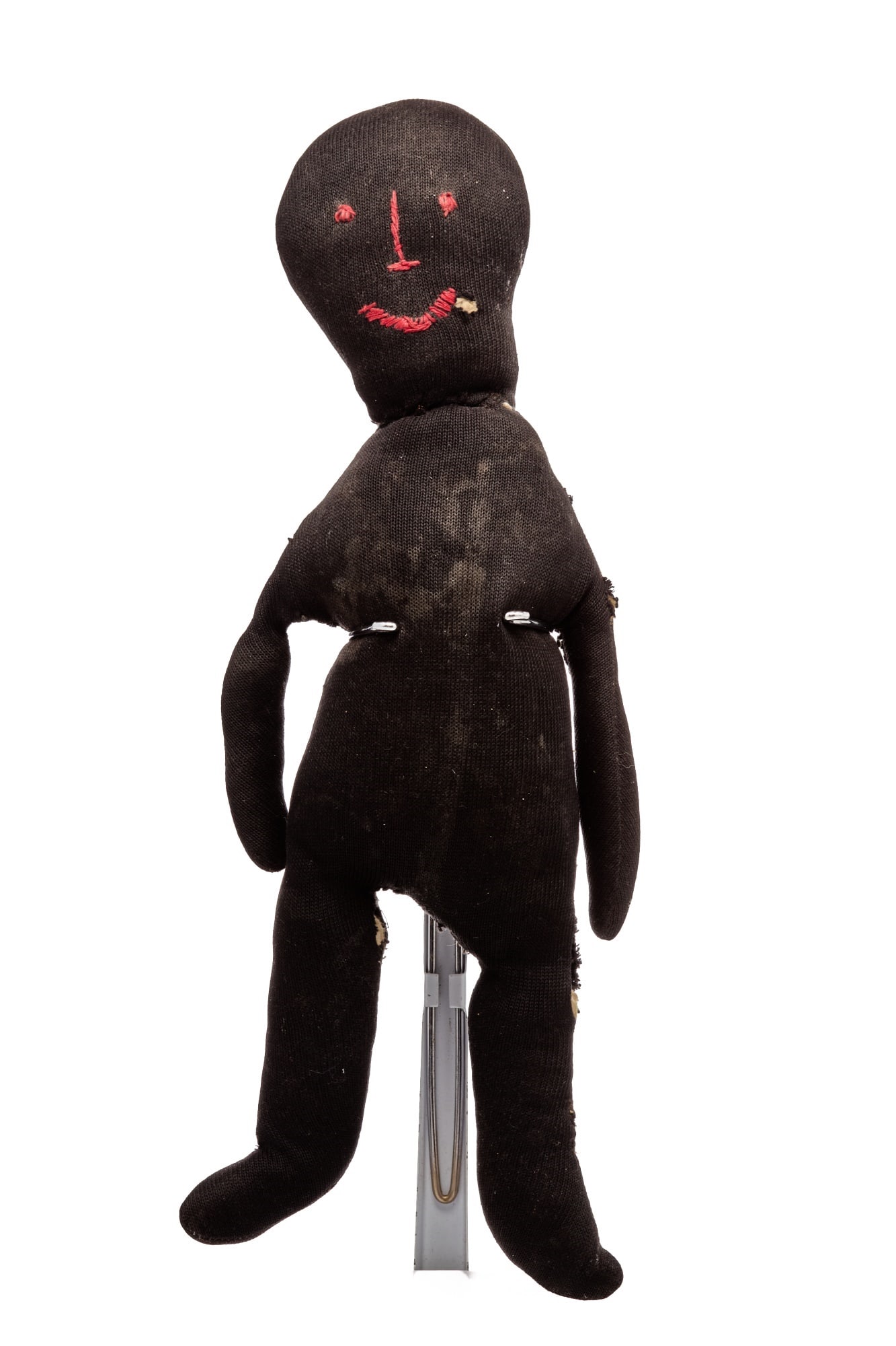 14 IN HAPPY STOCKINETTE DOLL: She is just the right size and shape to fit in a hand or hold by and arm. She is the way I found her, no clothes. I have always liked her that way. With a big smile and an upside-down T for the nose a