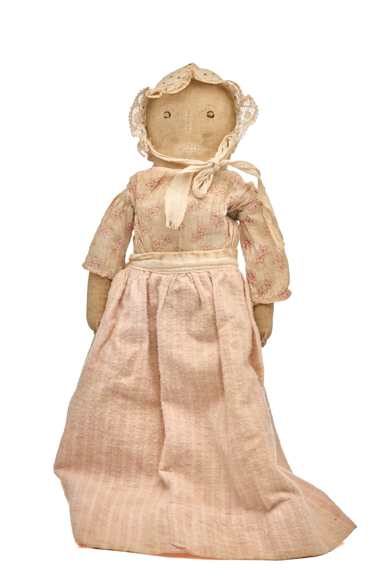 9 IN EMBROIDERED FACE STUMP DOLL: This stump doll I do believe had legs at one time but she sits easily, it is not evident that she is missing legs when she is sitting. She has very nicely embroidered eyes but the rest of her face the