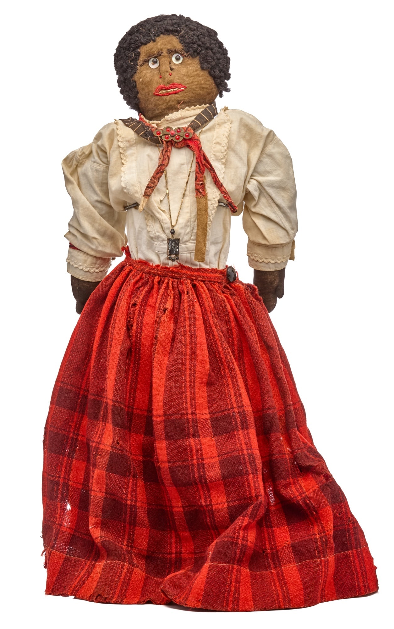 24 IN BIG INTENSE BLACK DOLL: This impressive character has intense eyes, great eyebrows, tiny nose, and wide mouth with many teeth, and she doesn't look like she will be smiling anytime soon. She has dense curly black wool hair s