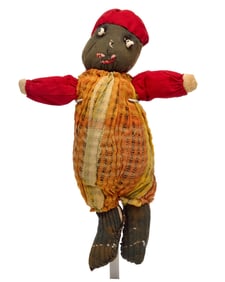 10 IN SOCK DOLL WITH INTERESTING CLOTHES