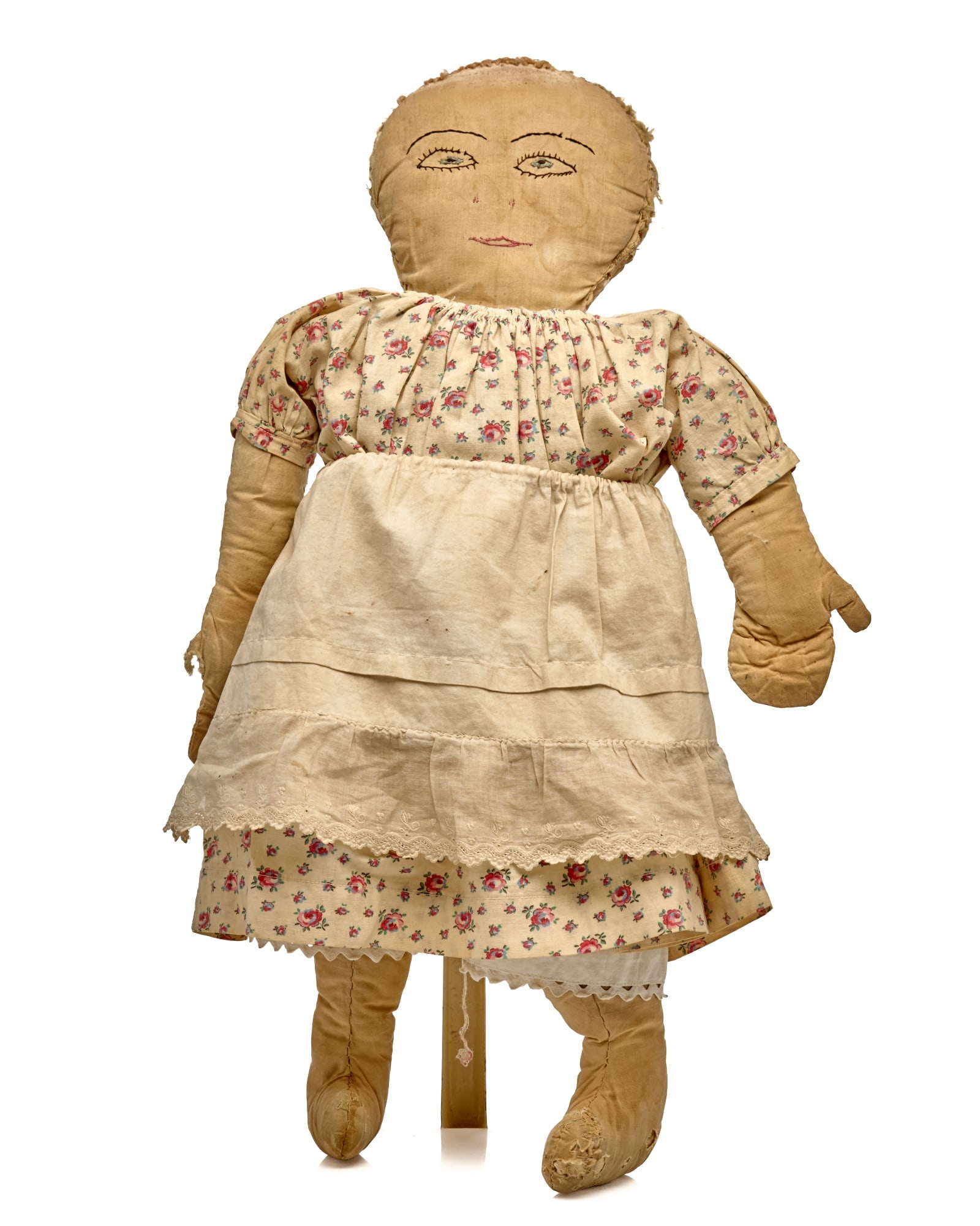 21 IN. CLOTH DOLL with EMBROIDERED FACE Circa 1890: Embroidered face cloth doll with extreme hairdo antique 21 inches. This is a nice antique cloth doll with a sweet embroidered face. She has blue eyes with eyelashes all the way around and pink floss m