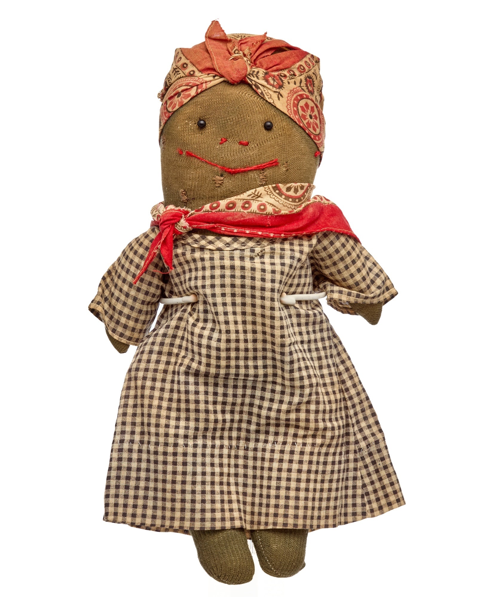 13 IN FUNNY SOCK DOLL: She has a big grin, nice head wrap and well as the one around her neck. She is wearing a homemade simple, (made in a rush look) dress. She is cotton stuffed. c 1930. Condition: Good condition with age