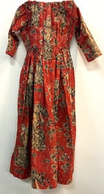 22 IN RED AND BLACK PRINT CHILD'S DRESS