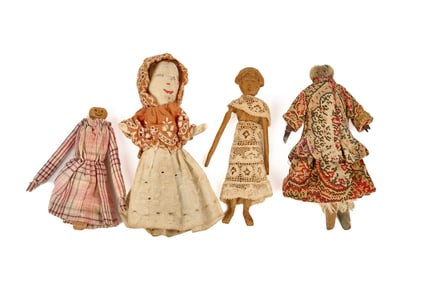 FOUR SMALL WOODEN DOLLS