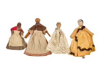 FOUR SMALL WOODEN DOLLS