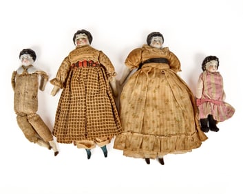 FOUR CHINA HEAD DOLLS
