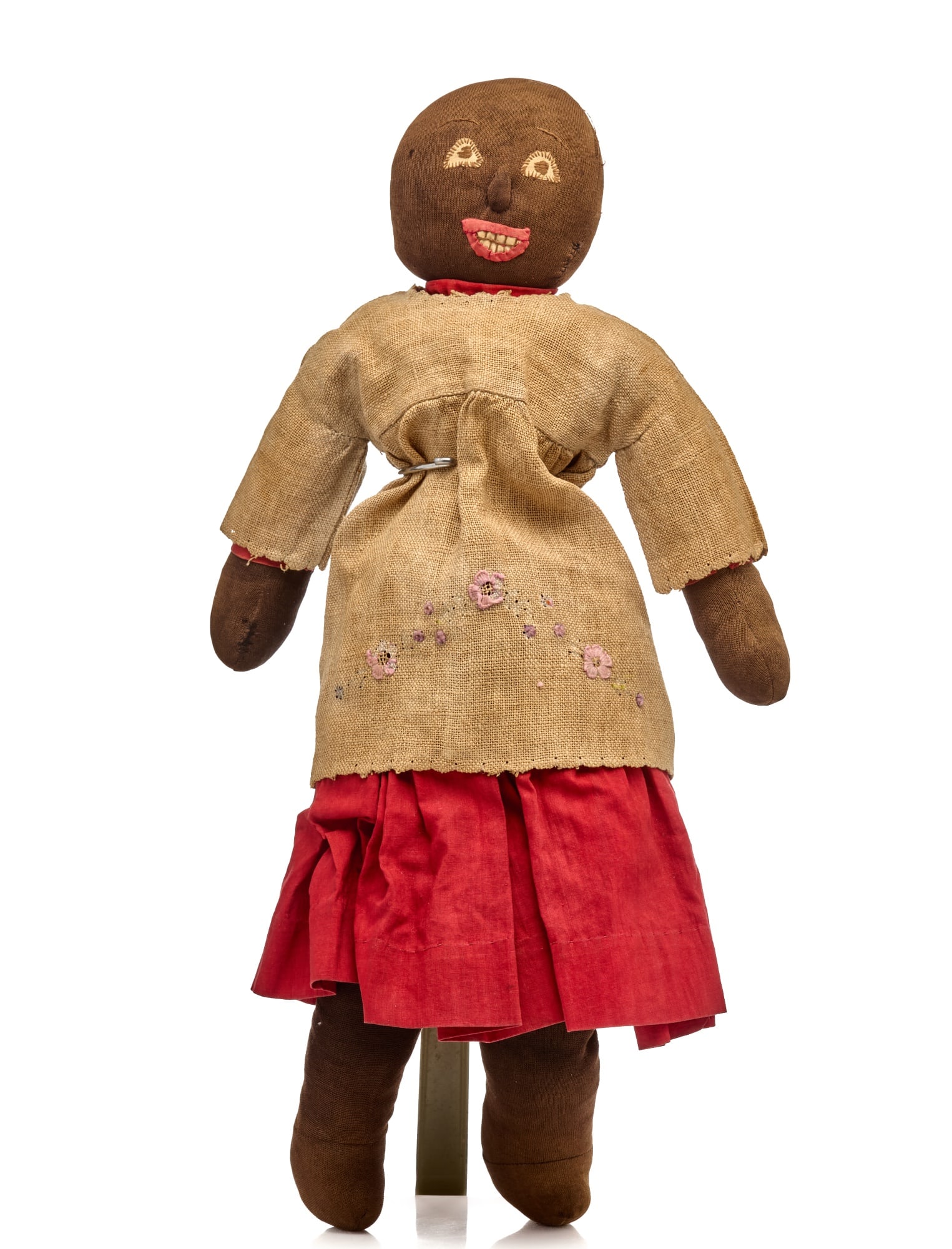 19 INCH BLACK STOCKINETTE DOLL with TOOTHY MOUTH: Happiness 19 inch stockinette doll heavy rag and cotton stuffed. With a little homespun linen top over a red hand sewn cotton dress, this sweet late 1800's doll is in very nice condition. Her body is 