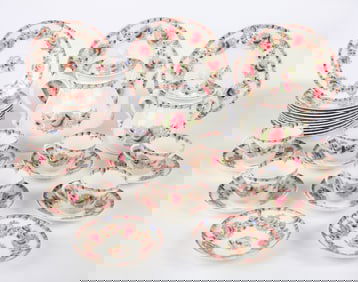 PARTIAL CHINA SET with FLORAL MOTIF