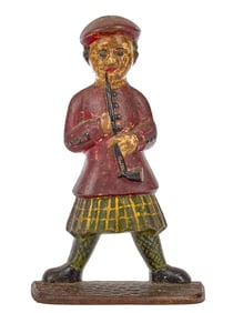 CAST IRON DOORSTOP of a SCOTSMAN with PIPE