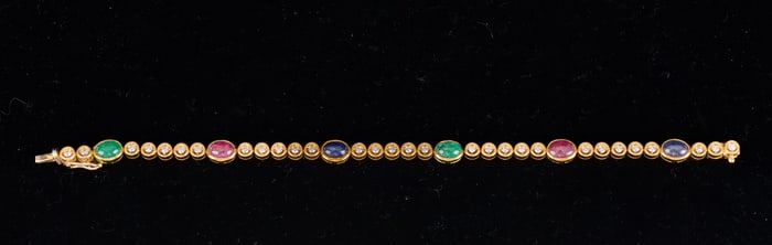 18k GOLD BRACELET set with the (4) PRECIOUS STONES