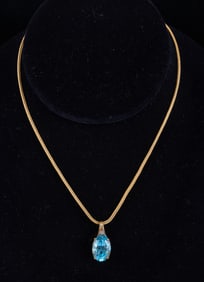 14k GOLD NECKLACE with LIGHT BLUE SAPPHIRE PENDANT