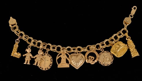 MARKED 14k GOLD CHARM BRACELET