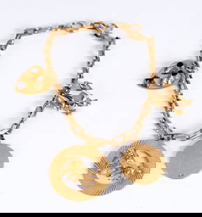 14k GOLD CHARM BRACELET: 7 inches. 13.3 dwt (gross weight including 1/20 gold filled Temp No 2776