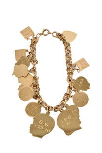 14k GOLD CHARM BRACELET with 14k GOLD CHARMS: 7 inches. 19.4 dwt. Condition: Engraved Temp No 2771