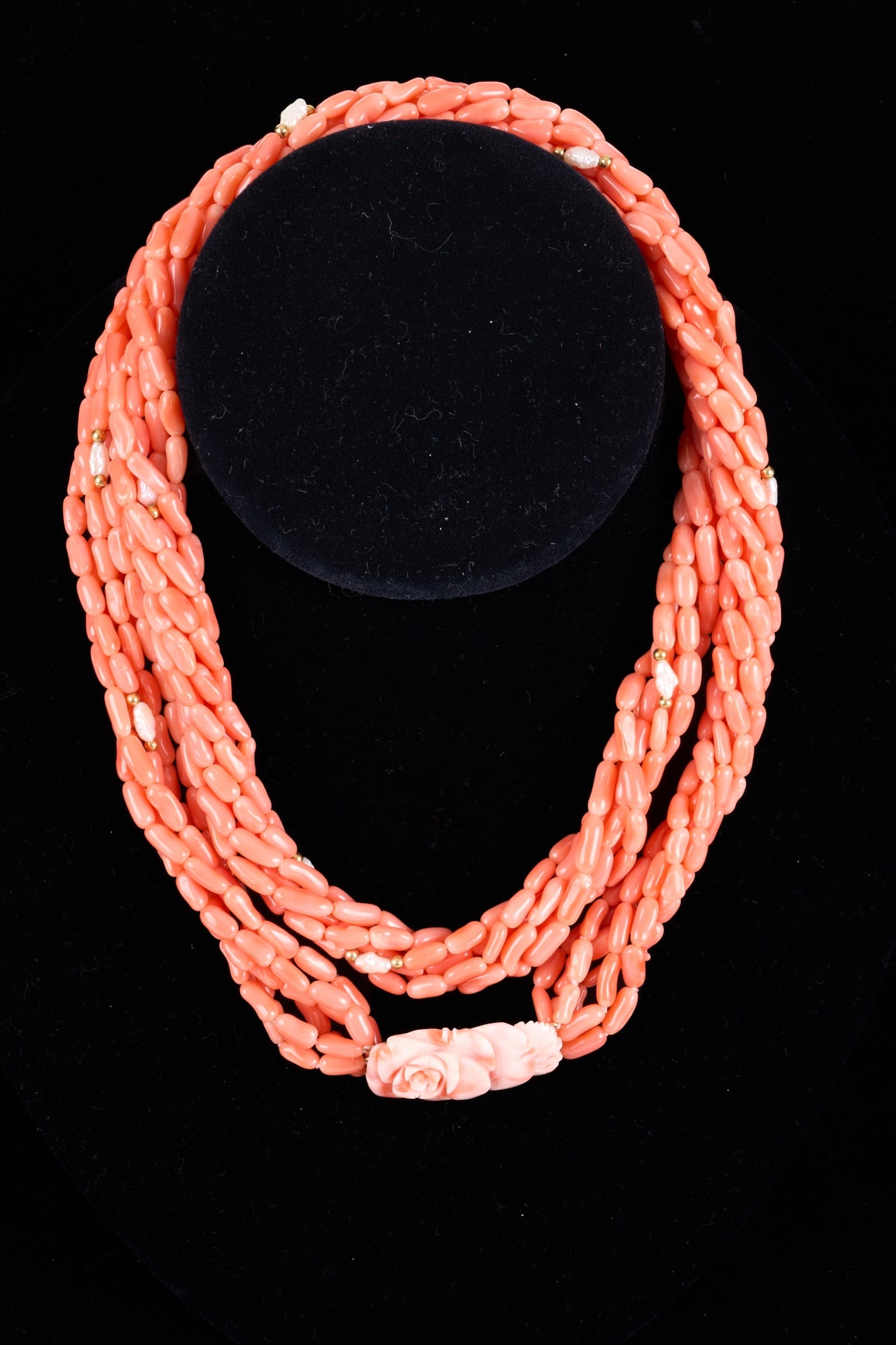 CORAL & PEARL NECKLACE with ROSE CARVED PLAQUE: Coral necklace with several Baroque pearls dispersed throughout, carved coral rose plaque with marked 14k gold fixtures. 15 inches. Condition: Good, fixtures marked 14k. Temp No 2977