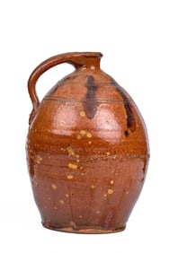 MANGANESE DECORATED (19th c) GLAZED REDWARE JUG