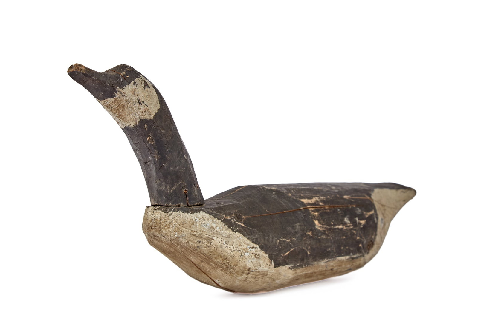 CARVED AND PAINTED CEDAR GOOSE: 11 x 24 x 5 inches. Condition: Shrinkage cracks. Temp No 2135