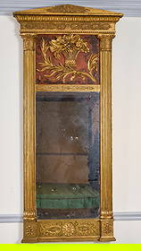 (18th c) SWEDISH GUSTAVIAN CARVED & GILT MIRROR: This mirror is as Neoclassical as you can get. Architectural cornice with applied gilt gesso anthemions, central tablet of carved & gilt floral basket over a faux tortoiseshell background, supported b