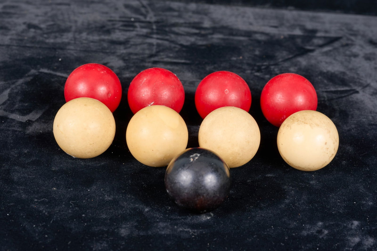 SET of (19th/20th c) BAGATELLE BALLS: Made of early plastic such as Bonzoline, Chrystalate, Xylonite, or Parkesine which were more durable than wood or bone. 1 1/4 inches. Condition: Worn from age & use. Temp No 9087
