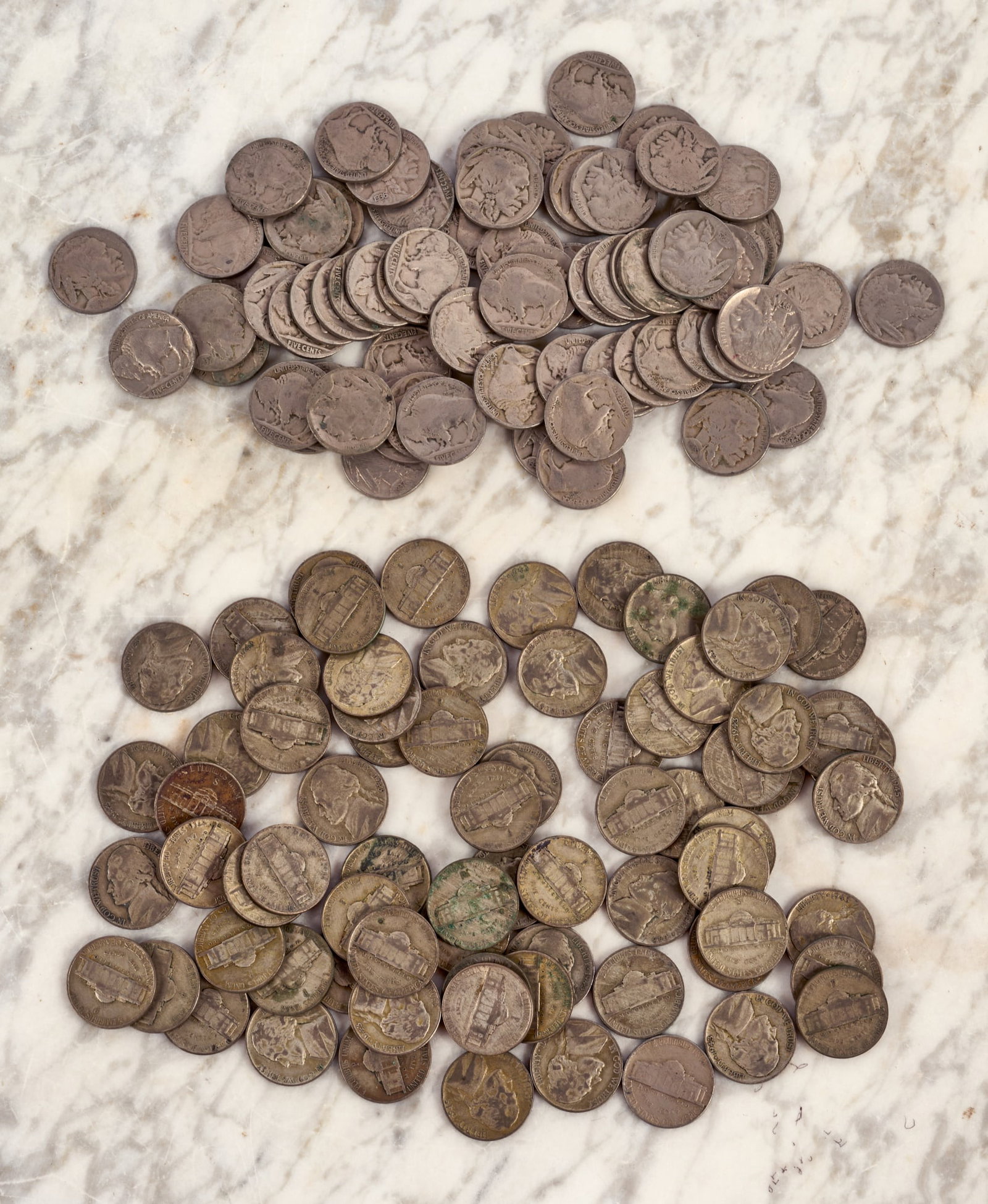 GROUPING OF U.S. BUFFALO AND WAR NICKELS: War nickels 1942-1945 with a variety of mint marks. (142) nickels total Condition: Varying degrees of condition. Circulated. See photos Temp No 7833