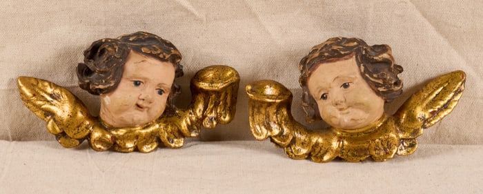 PAIR of (19th c) CARVED & GILT CHERUB HEADS
