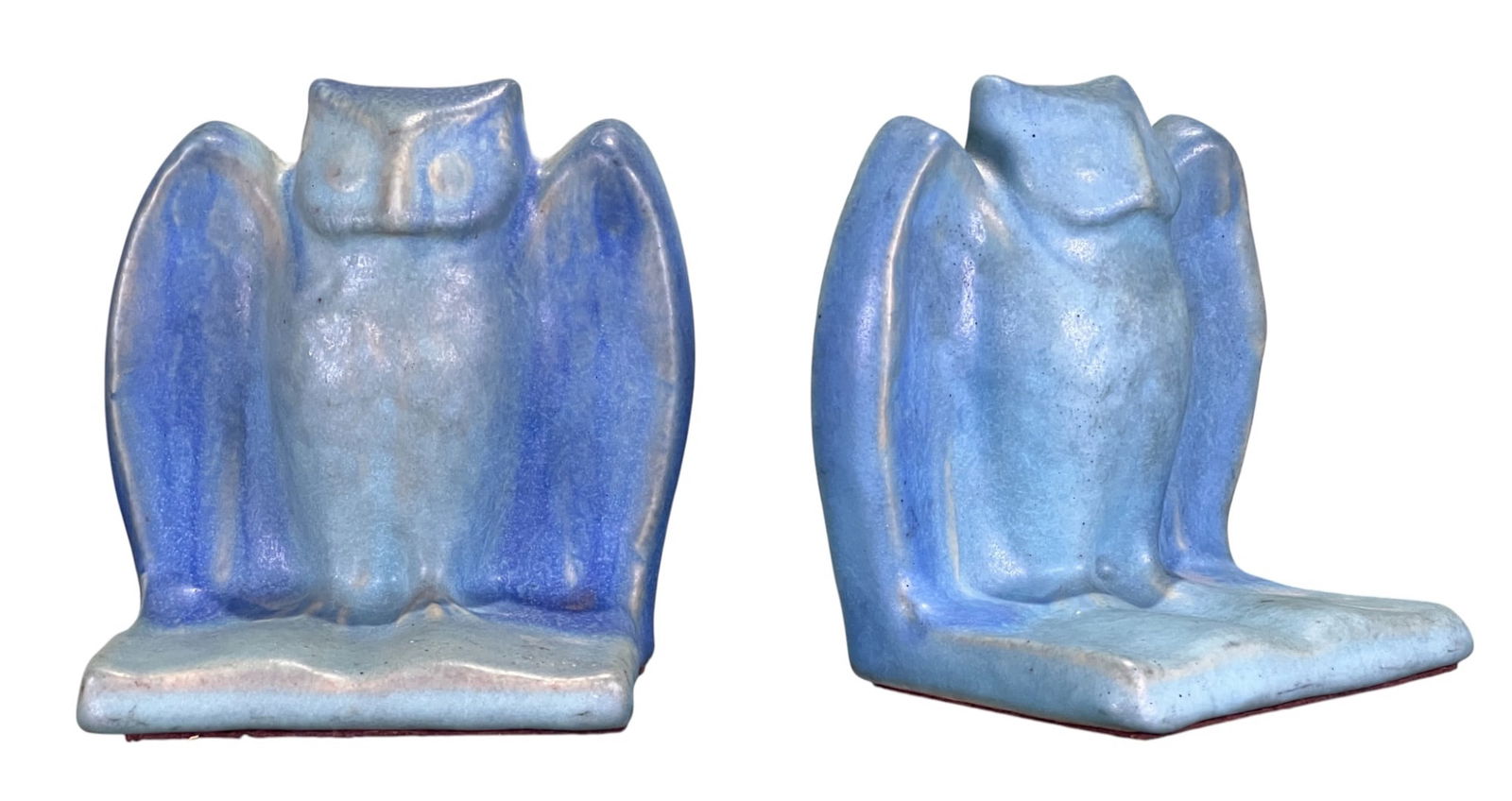 PAIR of VAN BRIGGLE ARTS & CRAFTS OWL BOOKENDS: Pair of Van Briggle Arts & Crafts owl form pottery bookends in matte blue glaze. 5 x 5 x 3 1/4 inches. Condition: Good. Temp No 8424