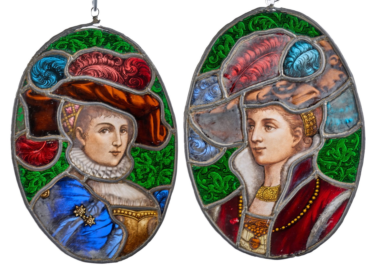 PAIR of OVAL LEADED GLASS PLAQUES: Depicting two 16th and 17th c Ladies. 14 x 9 3/4 inches Condition: Bloom to glass, (1) pane cracked, hanging rings absent or loose Temp No 7729