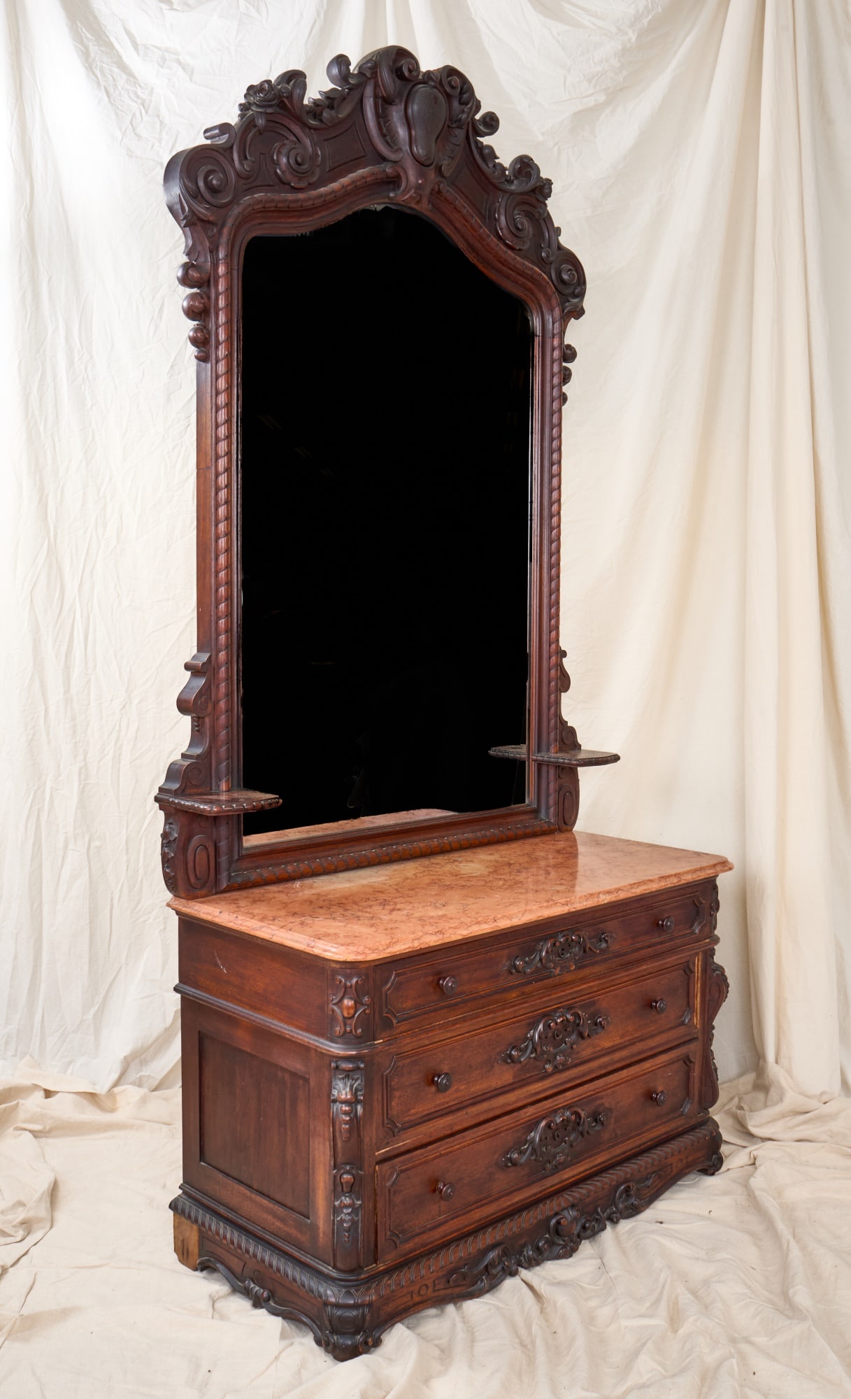 ROCOCO REVIVAL AMERICAN BLACK WALNUT MARBLE TOP LADIES CHEST: Impressively carved (19thc) chest with high style cartouche and full bloom roses. Marble top (3) drawer chest and birdseye maple interior. 101 1/2 x 48 x 22 1/2 inches. N.B. Makes up a (4) piece match