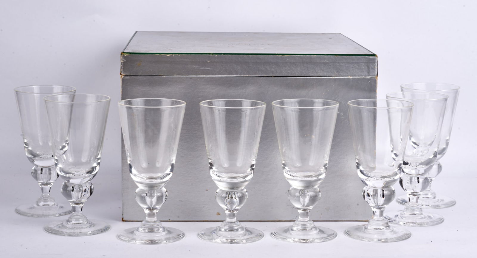 (8) STEUBEN GLASS WATER GOBLETS in ORIGINAL BOX: Pattern 7877, with original box and felt sachets. 6 3/4 inches. Condition: Good. Temp No 7914