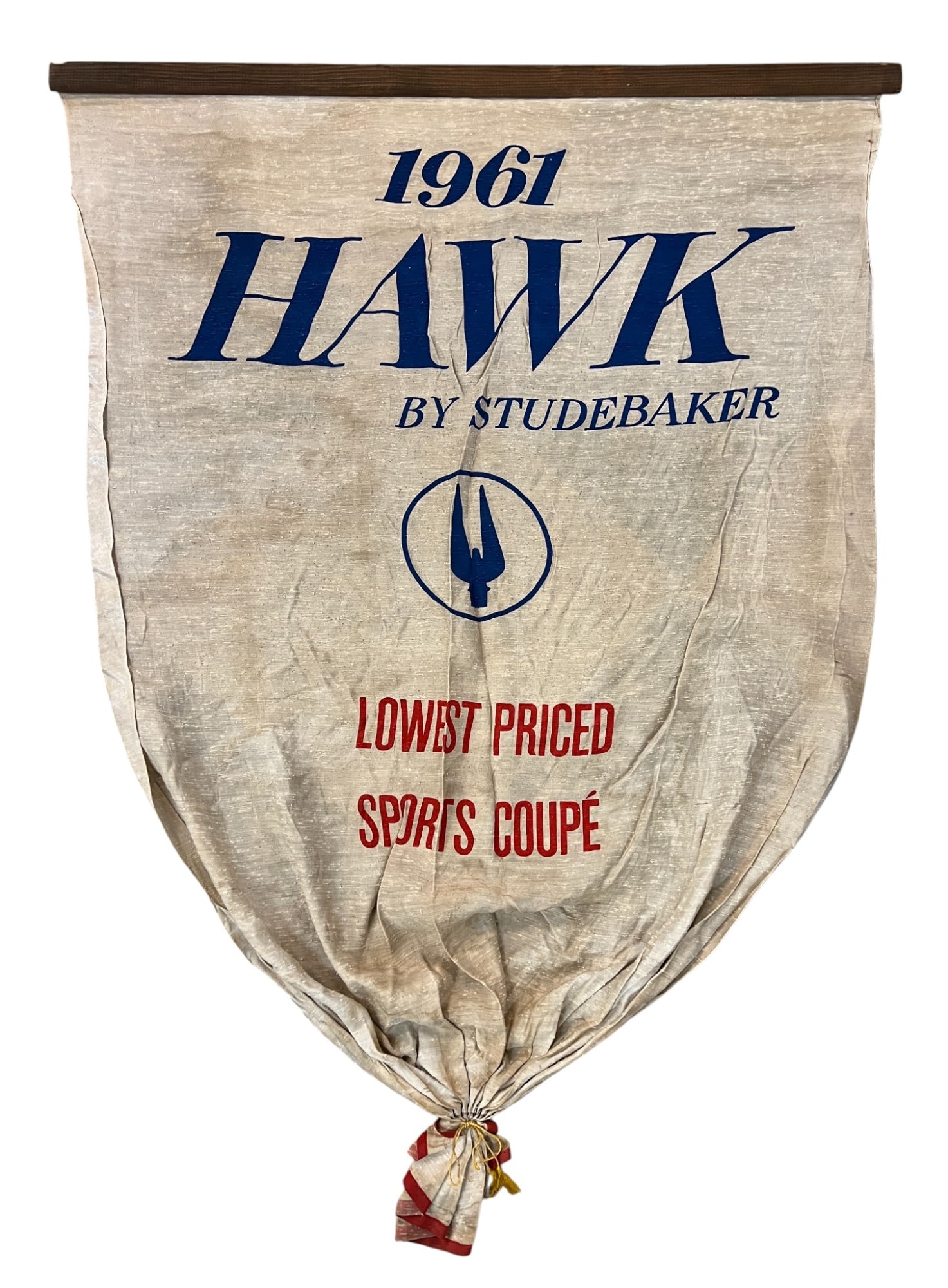 1961 HAWK by STUDEBAKER ADVERTISING PENNANT: Printed linen pennant advertising the 1961 "Hawk" model by Studebaker. 55 x 40 inches. Condition: Light discoloration/stains. Temp No 8425