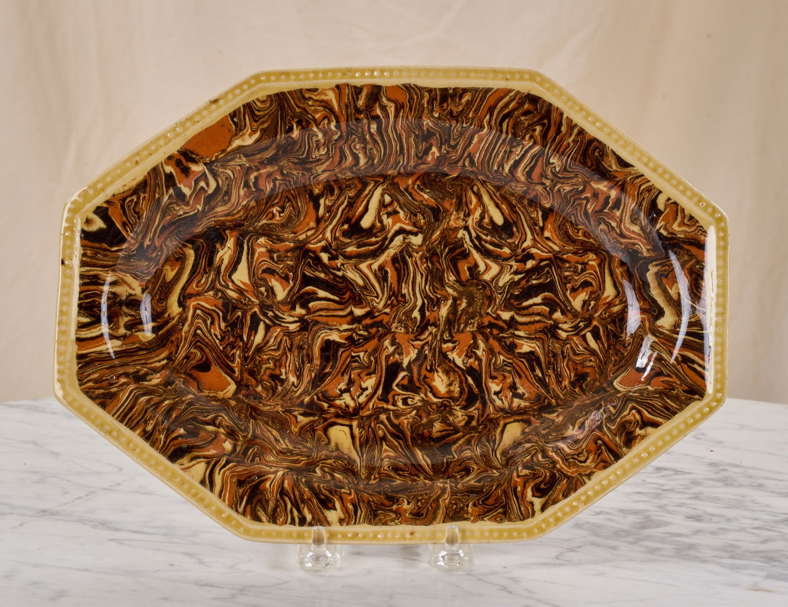 (19th c) SCRODDLEWARE DISHED PLATE: 8 1/2 x 11 1/2 inches. Condition: Good. Temp No 8076