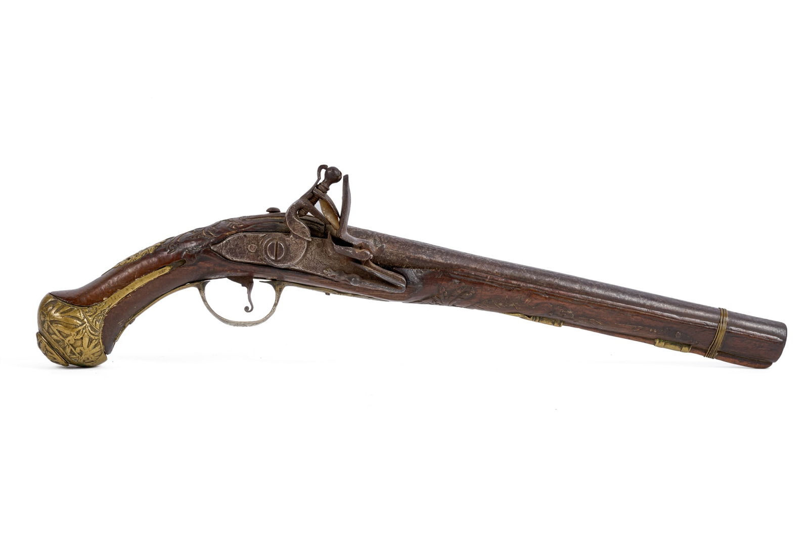 (18th c) OTTOMAN FLINTLOCK PISTOL: Nicely carved walnut body with engraved brass & iron mounts, underslung ramrod. 18 1/2 inches. Condition: Expected wear from age & use. Temp No 7680